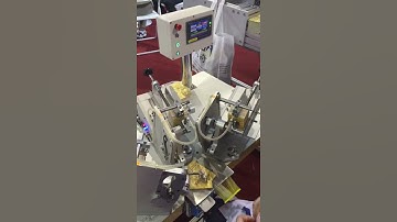 FM-703, Auto-Feeding three labels tagging machine