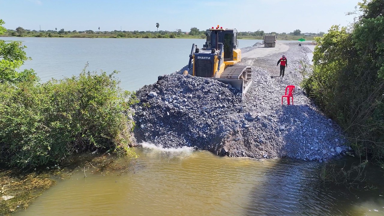 Wonderful Bulldozer SHANTUI Push Stone Into Water Lake, Dump Truck 25Ton Unloading Stone