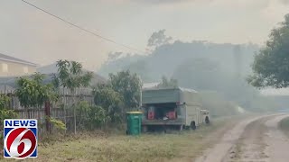 Brush fire burns dangerously close to homes in Kissimmee