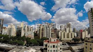 Cityscape View With Clouds Passing Overhead