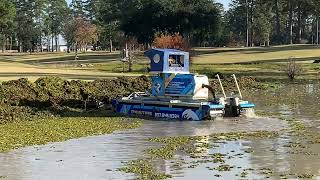 Pristine Pond Solutions removing giant salvinia from Golf Course with Truxor T-50