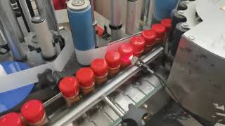 Automatic capping labeling machine for seasoning bottle #spindle capper #capping #factory #labeling