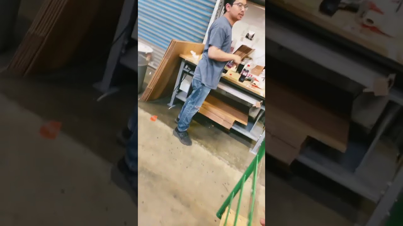 Homeless coworker sleeping in warehouse