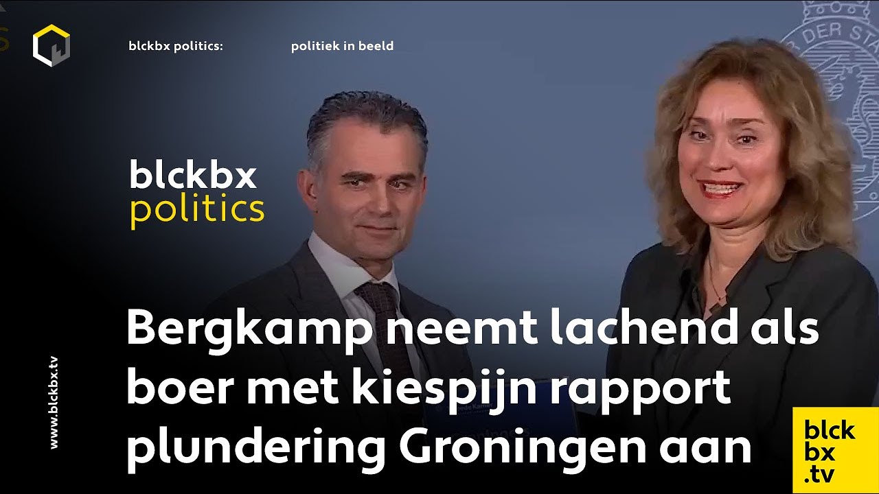 Bergkamp neemt lachend als een boer met kiespijn het rapport over
