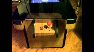 A Pac-Man coffee table i made,back in 2006,with a 15" monitor. Based on the original "cocktail arcade" they made in the 80