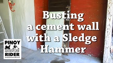 Breaking a Cement Wall with a Sledge Hammer