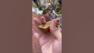 Bật lửa Dupont vàng kẻ sóng D12V ( 0918924444)