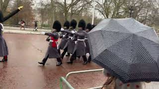 Scots Guards March to St James’s Palace on a Rainy Day