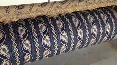 DYNAMIC RAPIER LOOM WITH ELECTRONIC JACQUARD