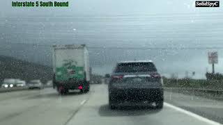 DRIVING UNDER THE RAIN SHOWER