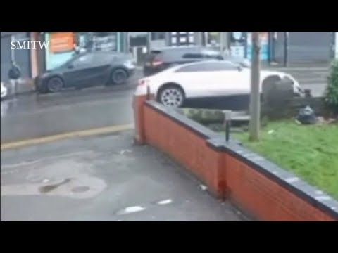 Shocking moment Audi A5 driver smashes into a motorbike sending rider flying in the air