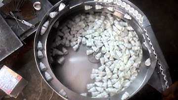 Vibrator Feeder For Eye Drop Bottle Cap by M. J. Industries, Ahmedabad