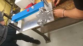 Model Conveyor Belt Project using Geneva Mechanism