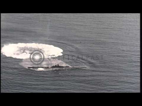 A partially sunken Japanese submarine explodes after being hit by a torpedo in...HD Stock Footage