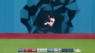Kevin Pillar destroys wall to make catch