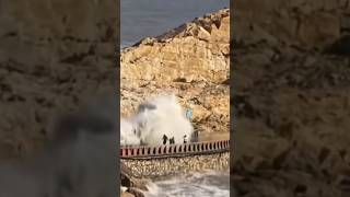 Boy swept away by large wave caused by Typhoon Dolphin