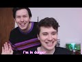 Phil giving Dan a haircut but it's just them being a twat to each other
