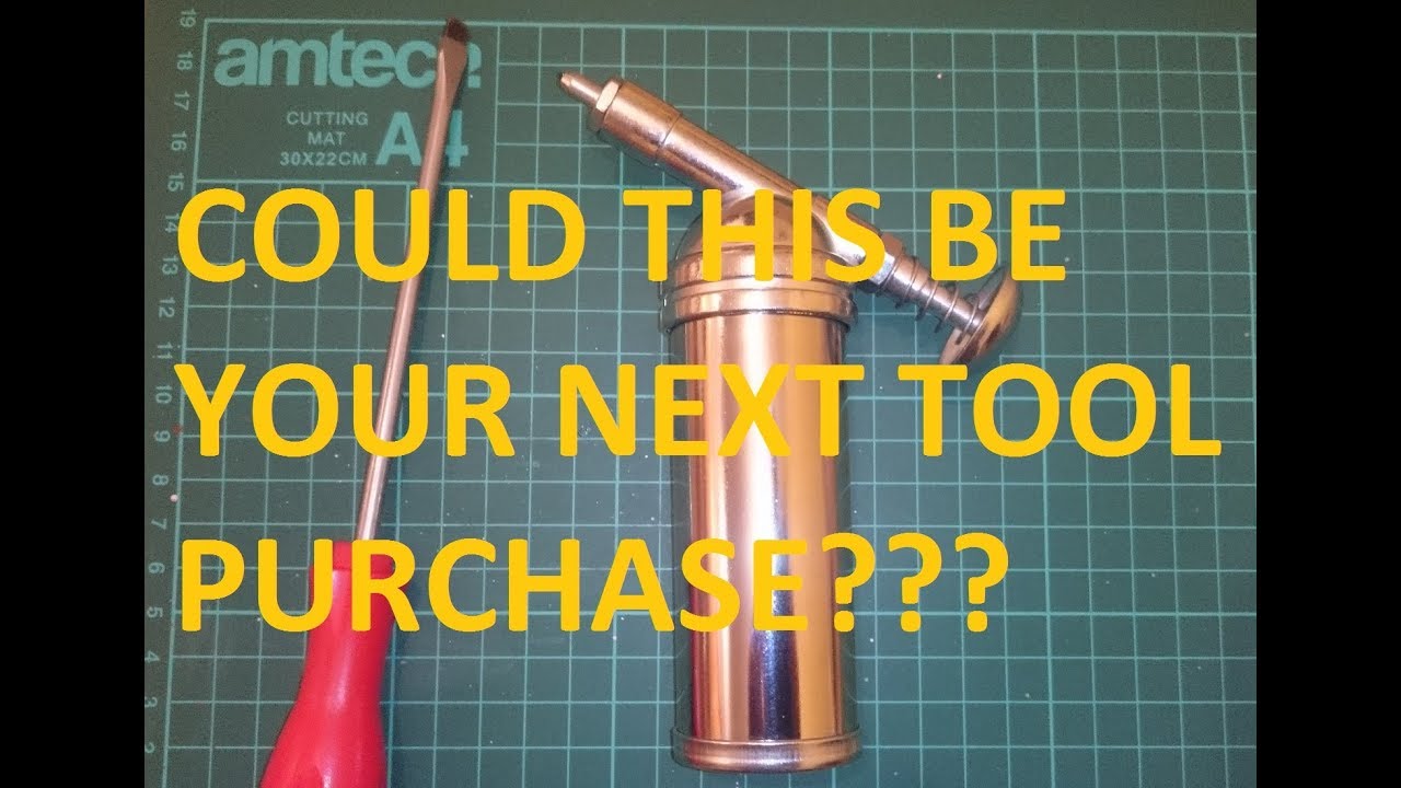 How To Cleanly Load Your New Mini Grease Gun - YouTube