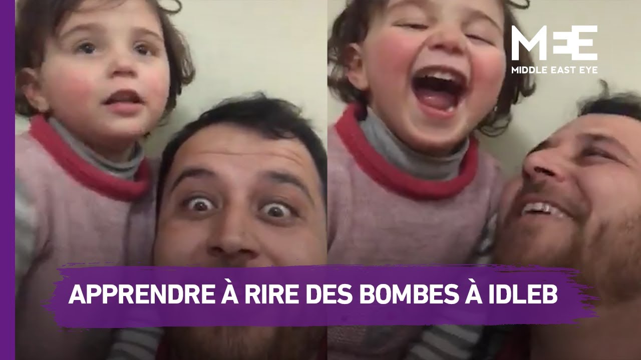 Un Syrien apprend à sa fille à rire des bombardements aériens