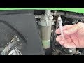 John Deere 1025R fuel filter change + water in bowl?