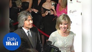 Olivia Newton-John and Patrick McDermott attend 2005 premiere - Daily Mail