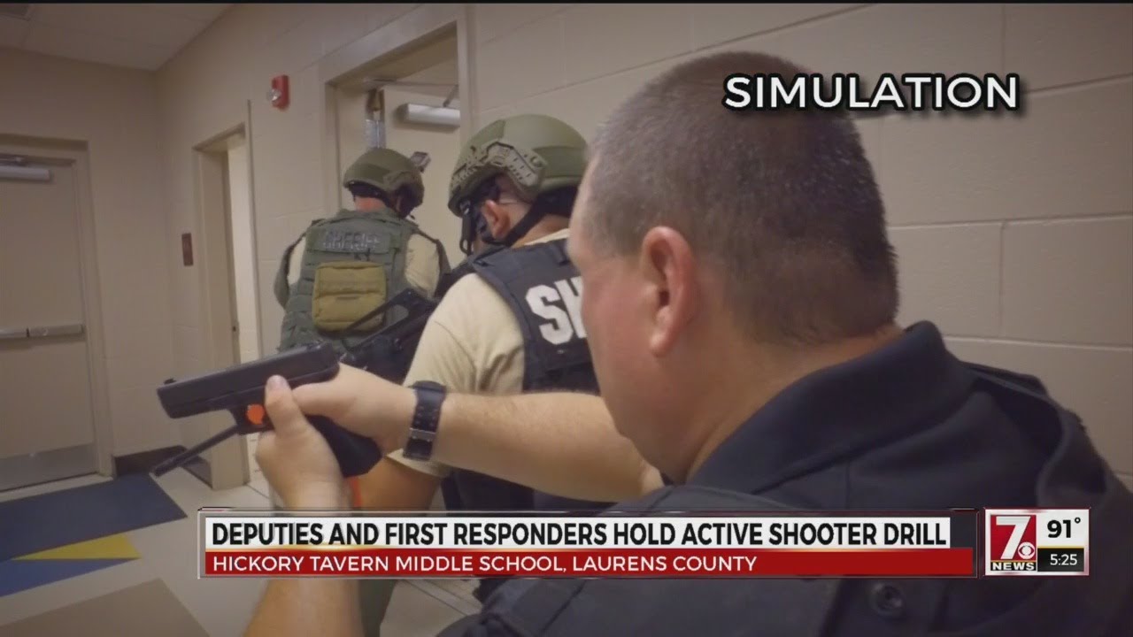 WATCH: First responders train for an active shooter in a school - YouTube