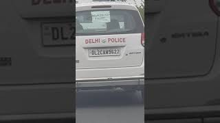 Delhi Police breaking rules openly while escorting some V.I.P. vehicle ahead of their vehicle..