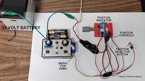 Push button servo mover with indicator LEDs