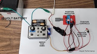 Push button servo mover with indicator LEDs