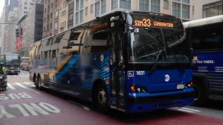 NYCT Bus: 2025 Prevost X3-45 #1631 SIM33C / #1632 Not In Service at 5th Avenue and 38th/39th Streets