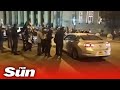 Female driver ploughs through Breonna Taylor protesters