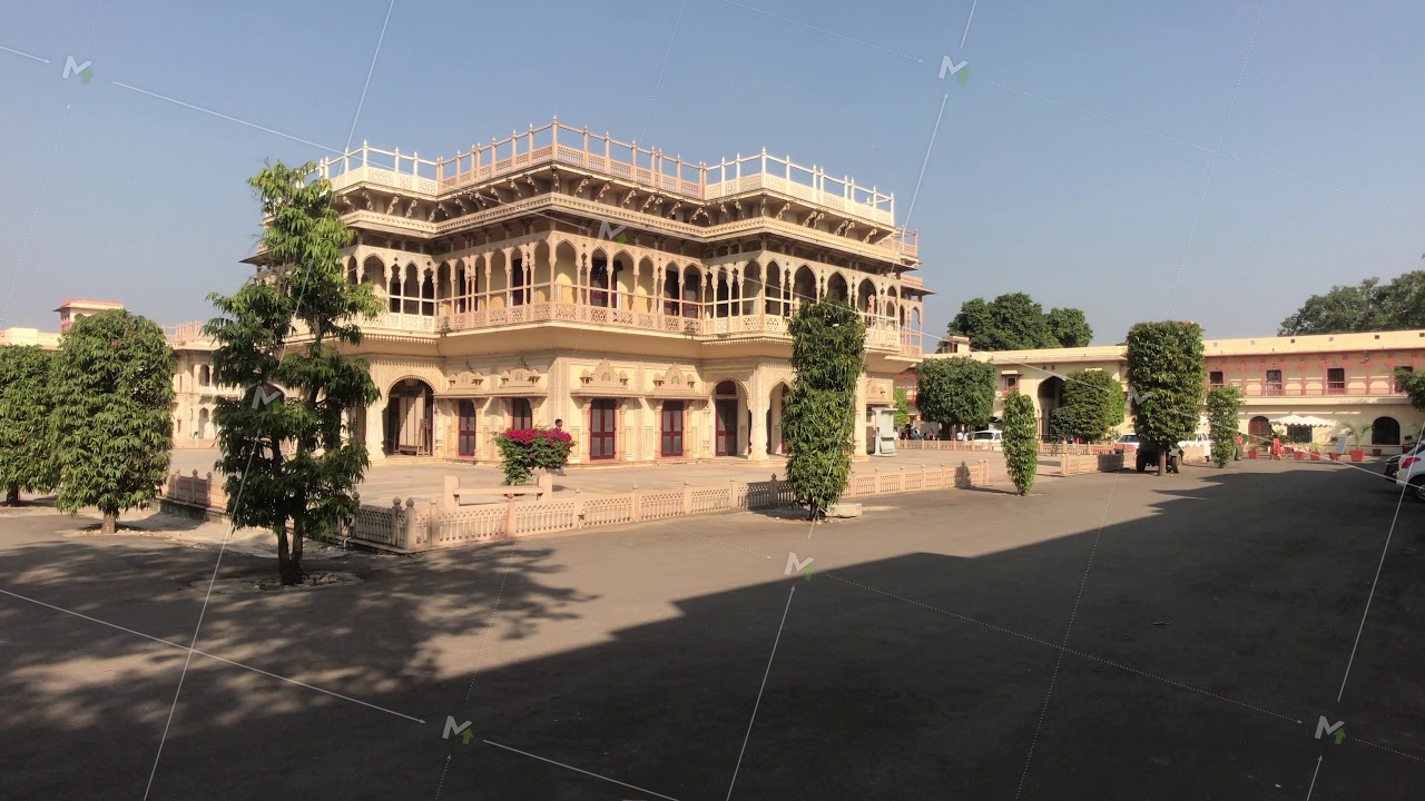 Jaipur, India - November 04, 2019: City Palace and tourists walk past