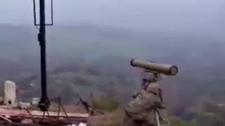 Azerbaijan soldier firing a 9M133 Kornet ATGM at Armenian forces