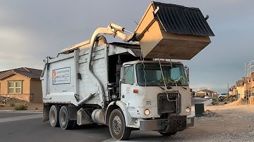 Growling Autocar WX64 - Heil Half/Pack Front Loader Garbage Truck