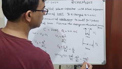 An air-filled parallel plate capacitor with plate separation 1 mm has a capacitance of 20 pF