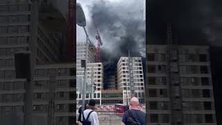 Fire at Canning Town sees black smoke engulf apartment buildings