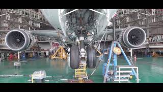 Giant wheels drop! Inside the 787-9 gear test.