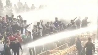 Rape protesters hit with water cannons