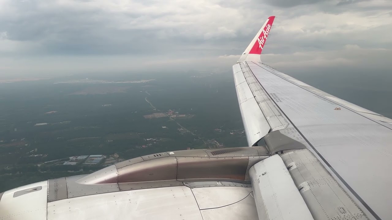 Air Asia A320Neo landing at WMKK Airport 