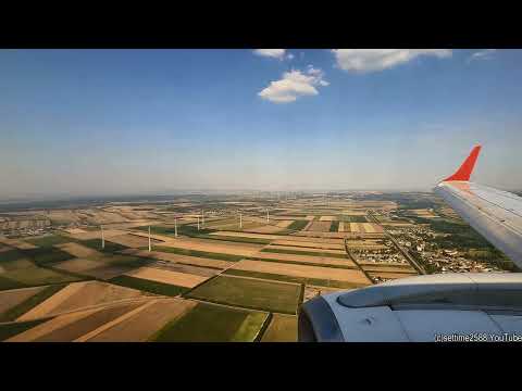 Landing in Vienna International Airport. Embraer 195 Austrian Airlines from Milano Malpensa