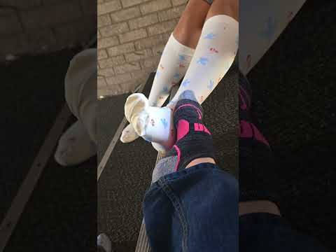Playing footsies In public