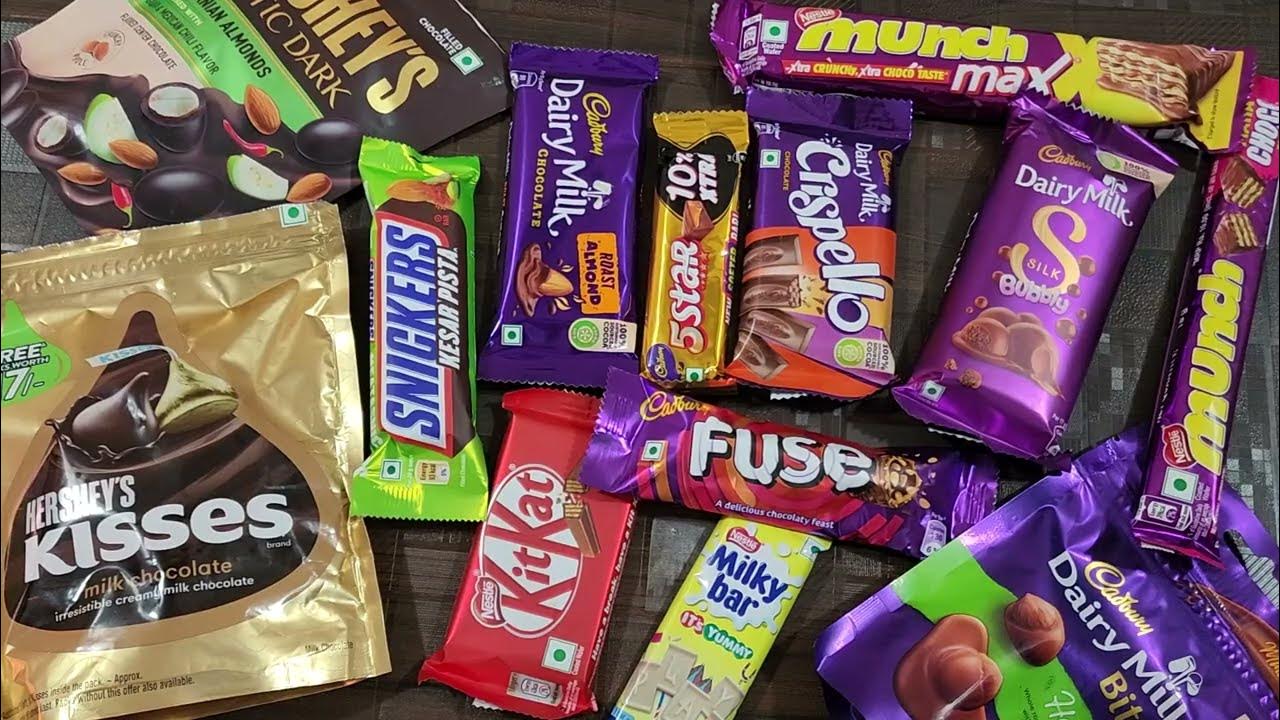 lots of candies, lots of chocolates, surprise toys, chocolate opening