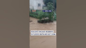 Rescuers evacuate residents in flooded  south and east China