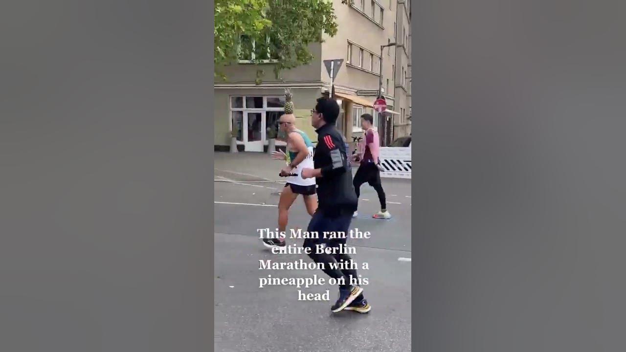 Man run Marathon with pineapple on head YouTube