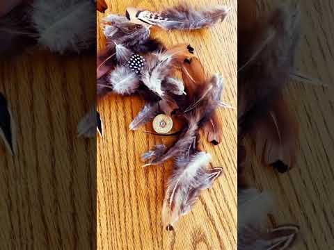 Handmade feather hatpins.