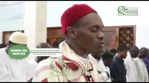 تلاوة خاشعة للقارئ السنغالي محمد الهادي توري ((تَكَادُ السَّمَاوَاتُ يَتَفَطَّرْنَ مِنْهُ وَتَنشَقُّ