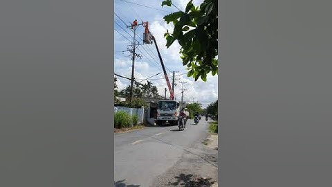 Đứng ở gần nhà máy xay lúa dưới cầu Bình Thủy 2, QL91B