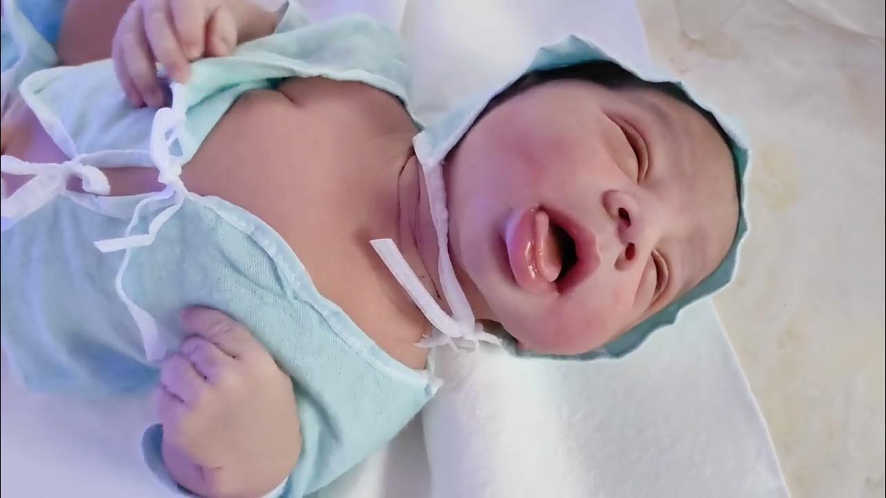 Newborn baby boy so tired after birth cute adorable babies boy 