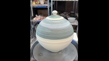 A Glazed chattering/ Sgraffito Lidded Jar