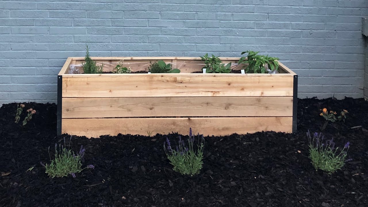 How to Build a Raised Garden Bed with Cedar Pickets - YouTube